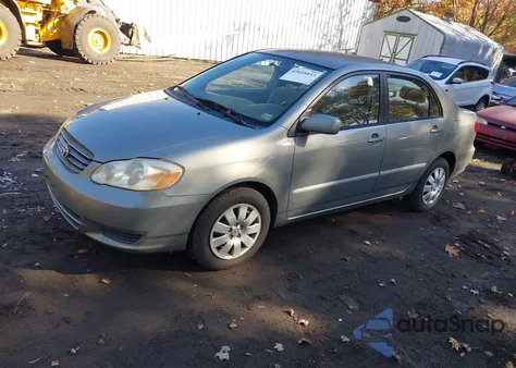 2004 Toyota Corolla Le z USA, uszkodzony, nr VIN JTDBR32E742025979